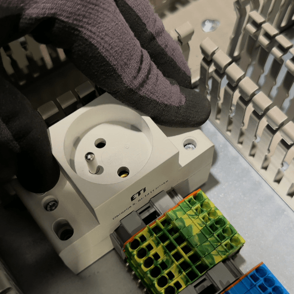 Mocowanie gniazdka elektrycznego